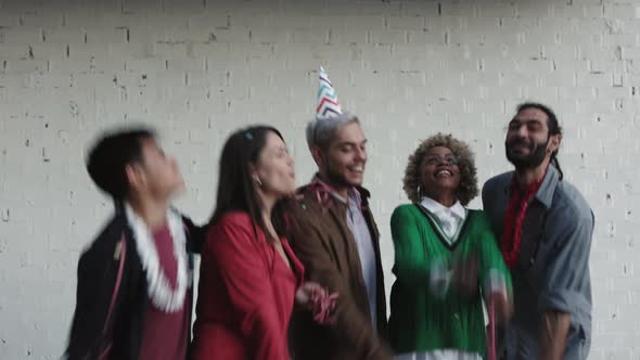 Happy Multicultural Trendy Friends Having Fun and Celebrating Together alt