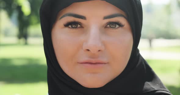 Closeup Muslim Woman in Hijab Head Scarf Smiles alt
