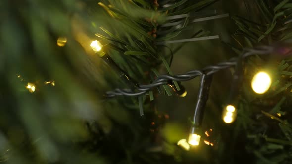 Close-up of Christmas  fairy-lights on garland slow-mo  1920X1080 HD footage - Slow motion sparkling alt