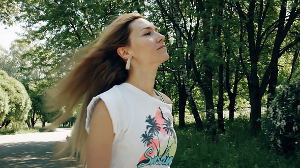 Girl Skates In The Park At Sunny Day alt