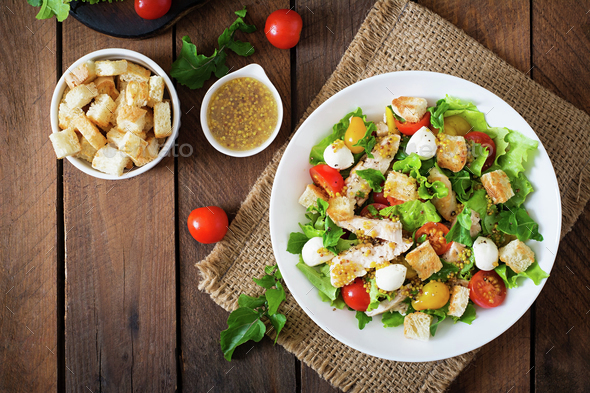 Salad with chicken, mozzarella and cherry tomatoes - Stock Photo - Images