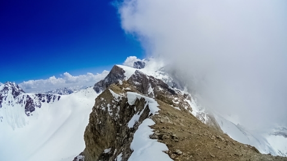 Cloudy At The Top Of The Ridge Mountain Sairam-Su alt