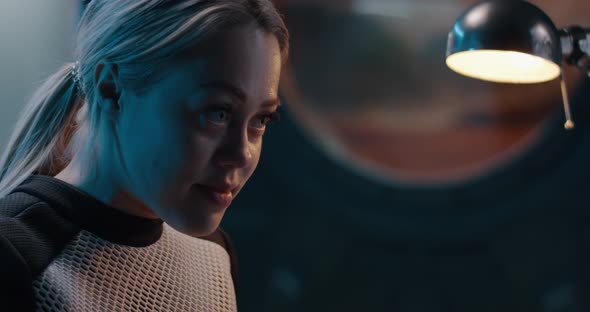 Female Astronaut Working on a Martian Base alt