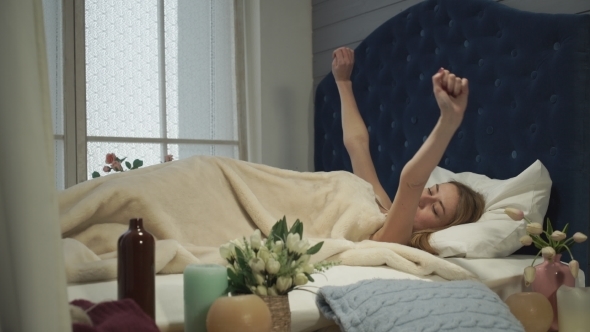 Girl Wakes Bed Stretches alt