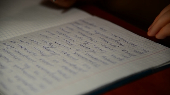  Boy Writes In Notebook Homework On Russian Language