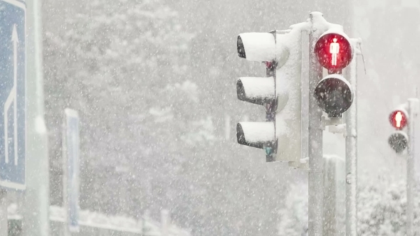 Red Light Shining During Blizzard
