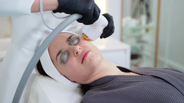 Rejuvenating Face Skin By Modern Phototherapy Method in Cosmetology Clinic alt