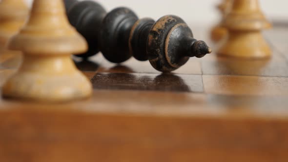 Shallow DOF end of game of wooden chess set match 4K 2160p 30fps UltraHD  footage - King of black pl alt