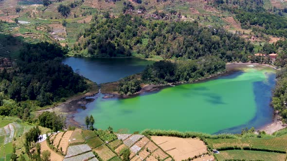 Cloud shadowe on Lake Warna in Dieng Plateau, Central Java Indonesia, aerial alt