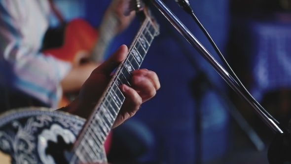 Guitarists  Playing Guitar And  Bouzouki. alt
