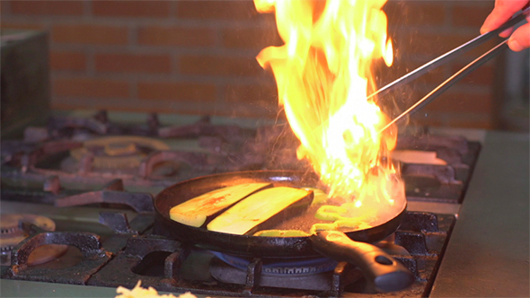 Cook Fries Eggplant and Peppers in the Kitchen alt