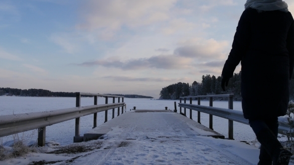 Young Woman Walking During Winter Holidays In Scandinavia alt