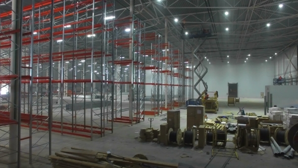 Aerial View Inside a Large New Modern Industrial Warehouse alt