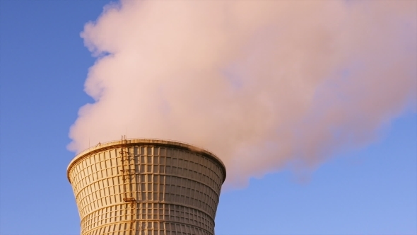 Water Cooling Tower Stack Smoke Over Blue Sky