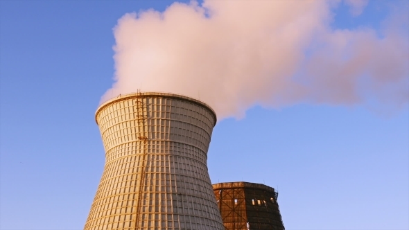 Water Cooling Tower Stack Smoke Over Blue Sky