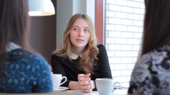 Girl Tells The Story Her Girlfriends In Cafe