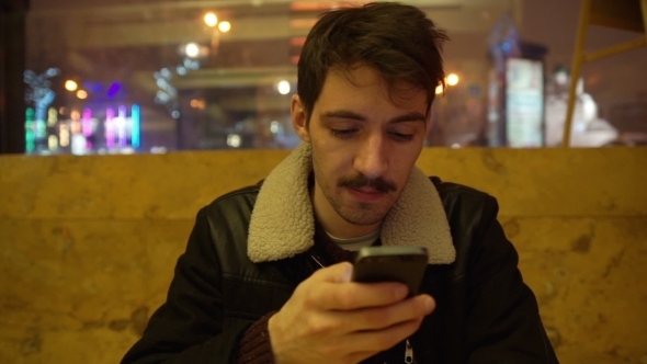 Man Using a Smart Phone