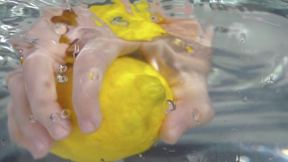 Hand Making Lemon Water