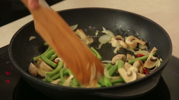 Chef Is Frying Vegetables On  Pan