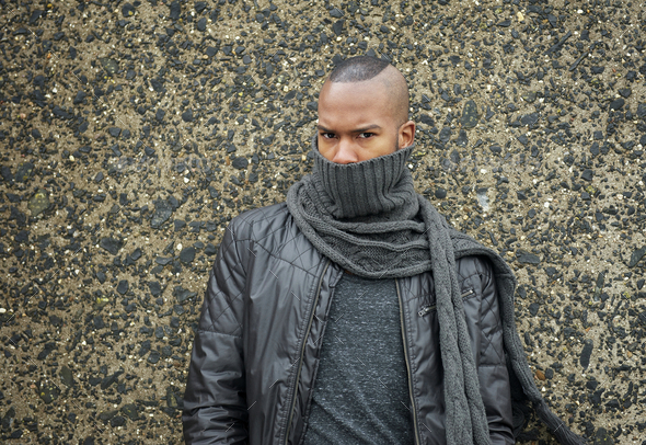 African american fashion model with scarf covering face