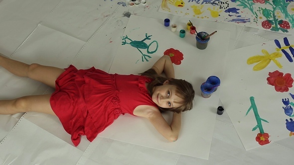 The Girl Lies on Her Back, She Drew the Brush on the Paper alt