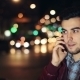 Young Man Calling On Mobile Phone At Night In City. - VideoHive Item for Sale