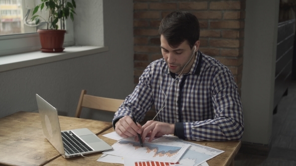 Manager Discussing Online Figures For The Month On The Table Are Charts And Tables. alt