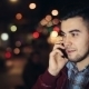 Young Man Calling On Mobile Phone At Night In City. - VideoHive Item for Sale
