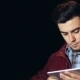 Young Caucasian Man With Tablet Computer In City At Night - VideoHive Item for Sale