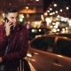 Young Man Calling On Mobile Phone At Night In City. - VideoHive Item for Sale
