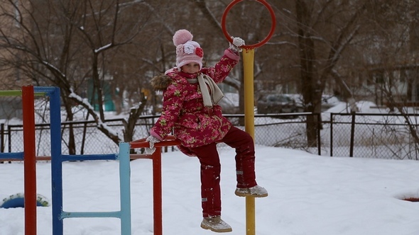 Girl Playing on the Sports Playground alt