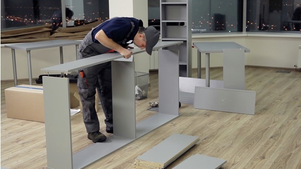 The Assembly of Office Furniture in the New Office alt