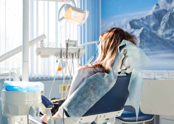 patient dentist sitting in the dental chair waiting for doctor. Stock ...