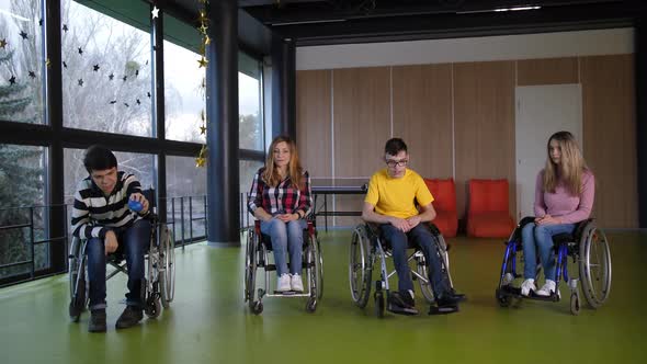 Disabled Teen Bocce Players Rejoicing in Victory alt