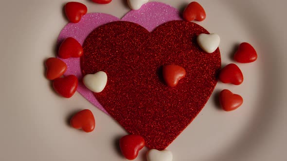 Rotating stock footage shot of Valentines decorations and candies - VALENTINES 0103 alt
