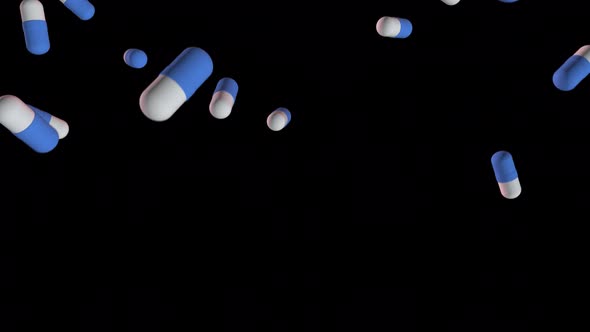 Blue-white medicines falling down pills, antibiotics, vitamins