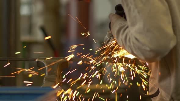 Sparks While Grinding In A Steel Factory