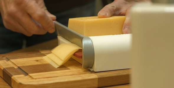 Man Cuts Cheese