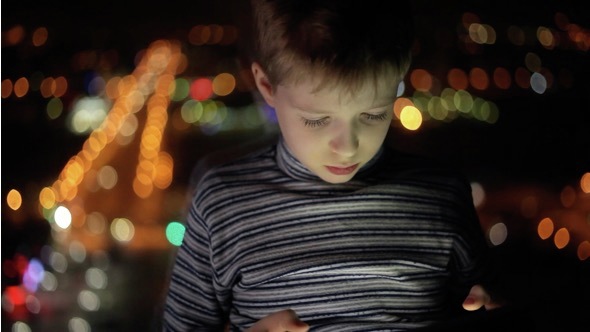 Boy Playing on a Tablet  Computer