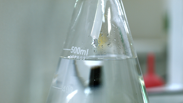 Water Drop to Flask in Lab
