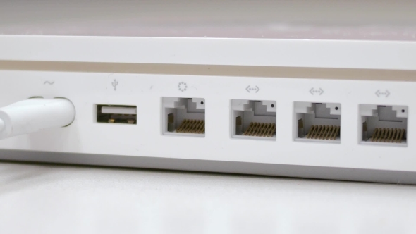 Plug In  Ethernet Cable In White Router alt