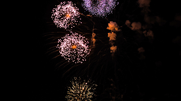 Colorful Firework Lights Streaks in the Night Sky