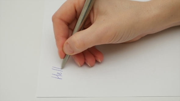 Female Hand Writes "My Dear Friend" On The Paper
