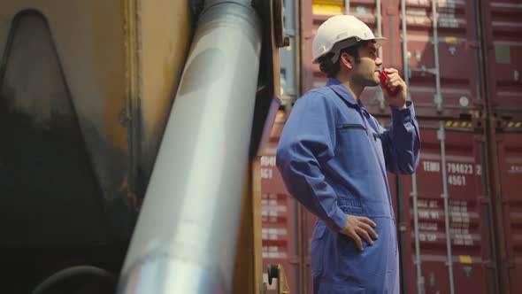 Senior cargo manager hand hold radio control working process alt