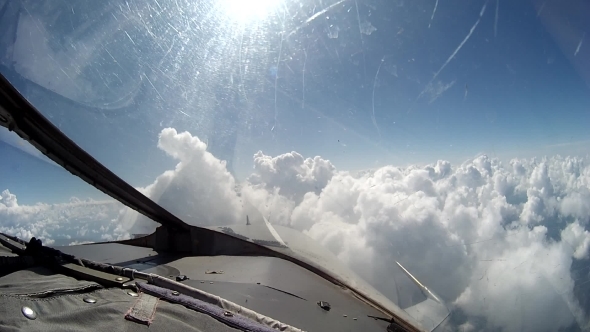 Flight Over Clouds View From Cockpit Plane.