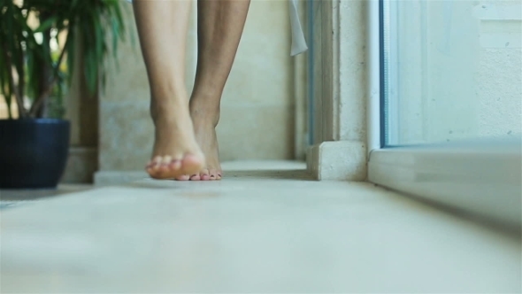 Bride Walking On The Windowsill Barefoot 