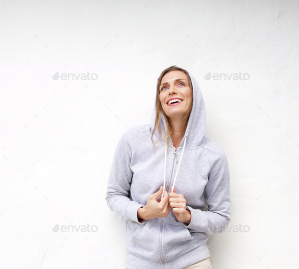 Cool older woman laughing with hood sweatshirt