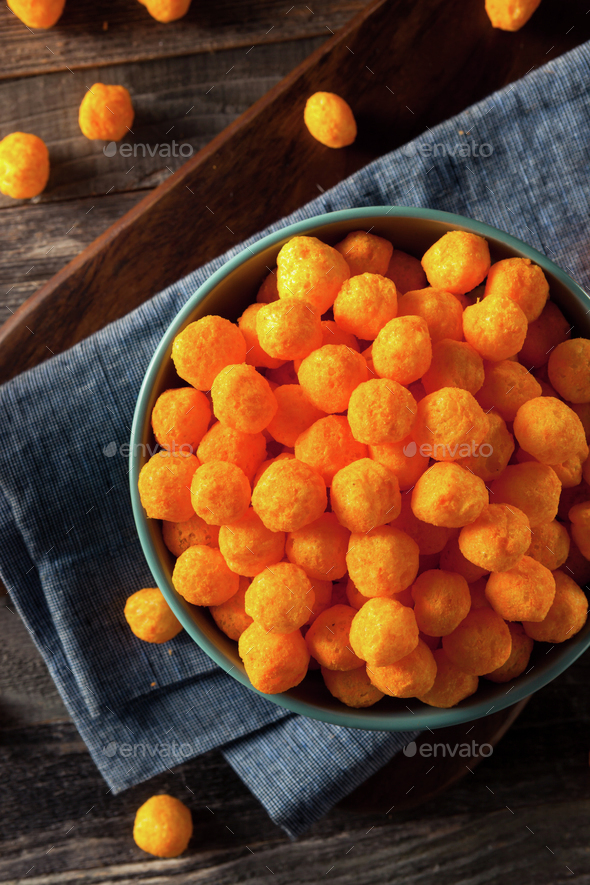 Unhealthy Cheesy Cheese Puffs Stock Photo by bhofack2 PhotoDune