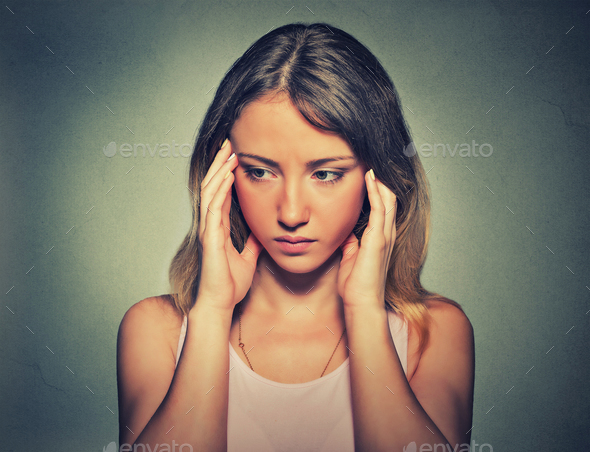 Portrait of a sad woman. Negative emotion facial expression feeling reaction