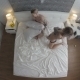 Young Couple Fooling Around In Bed - VideoHive Item for Sale
